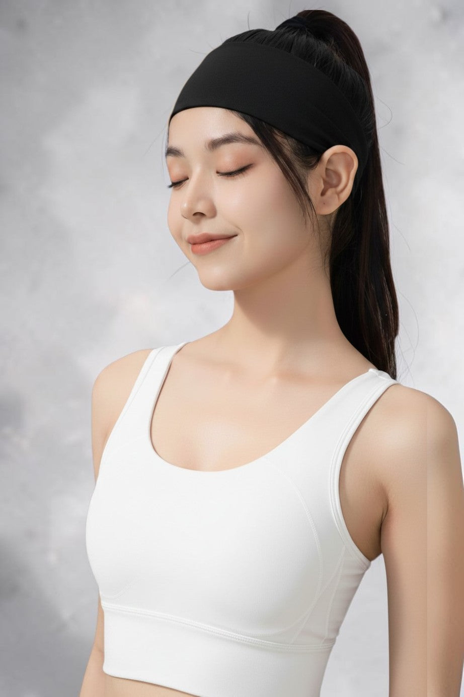 SOLID APPRL beige moisture-wicking athletic headband worn by a woman in a white sports bra for yoga and gym training.