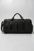SOLID APPRL black water-resistant nylon duffel bag with reinforced handles and adjustable shoulder strap for travel.