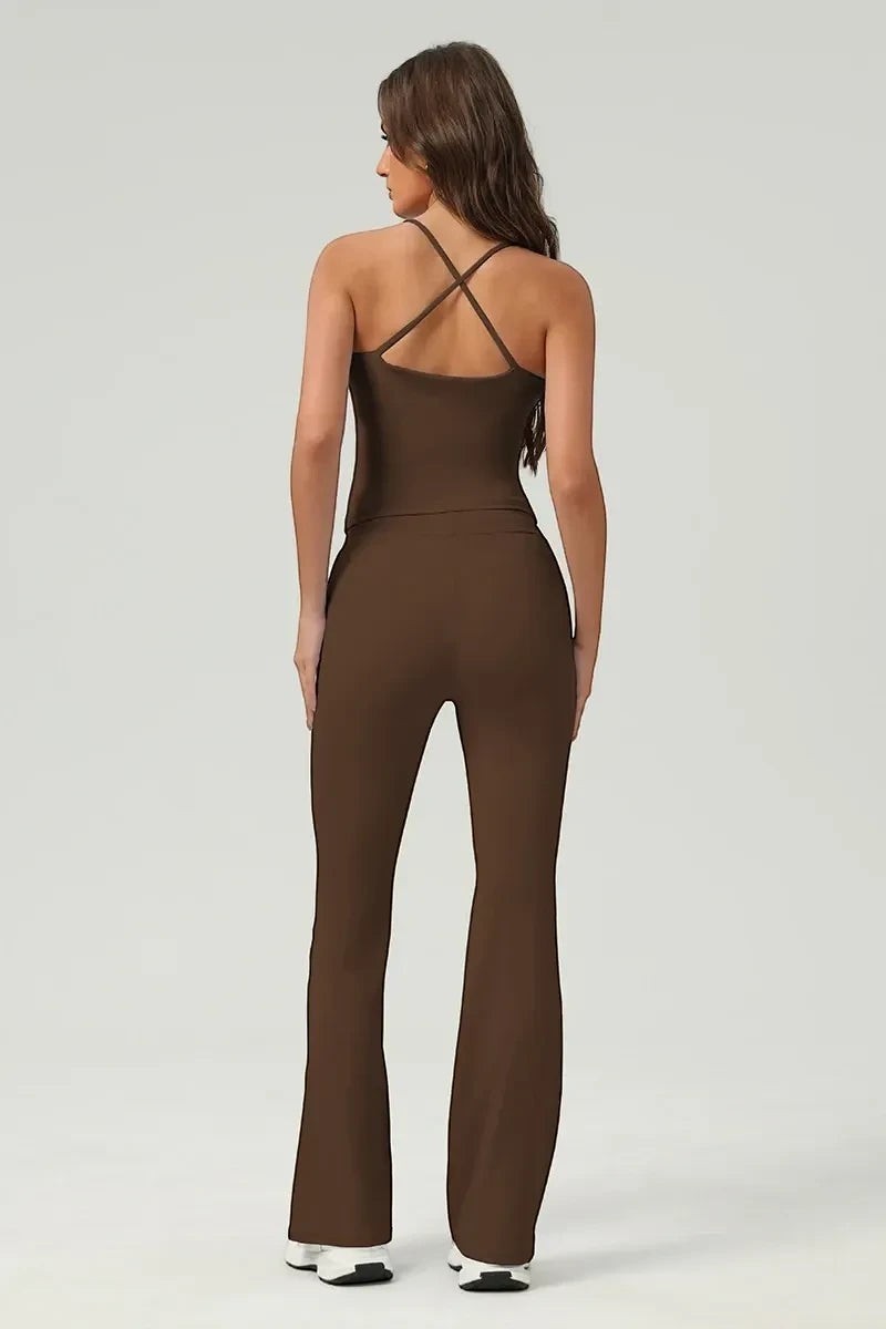 SOLID APPRL women's brown athletic tank top and flared leggings set with criss-cross back straps.