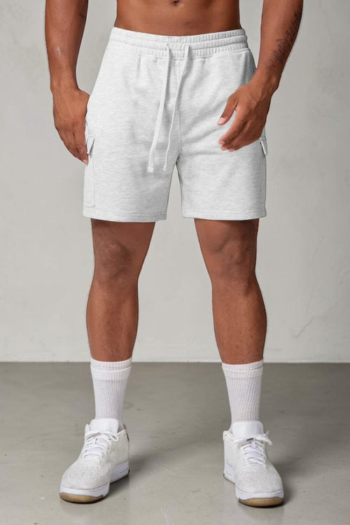 SOLID APPRL light grey fleece cargo shorts with an adjustable drawstring waistband and side pockets on a model.