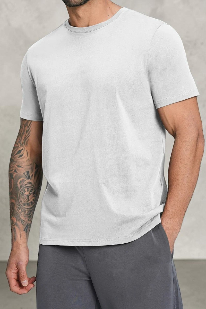 SOLID APPRL men's light grey crew neck short sleeve t-shirt with a classic fit on a tattooed model