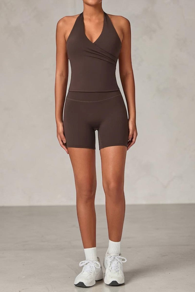 SOLID APPRL dark brown halter neck tank top and high-waisted biker shorts set in buttery-soft performance fabric.