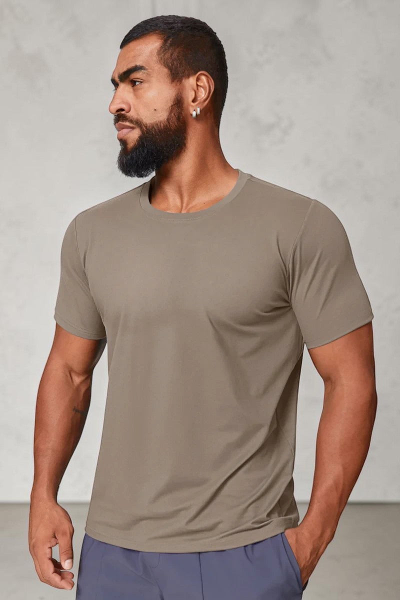 SOLID APPRL men's taupe moisture-wicking athletic crew neck t-shirt on a model for active and casual wear.