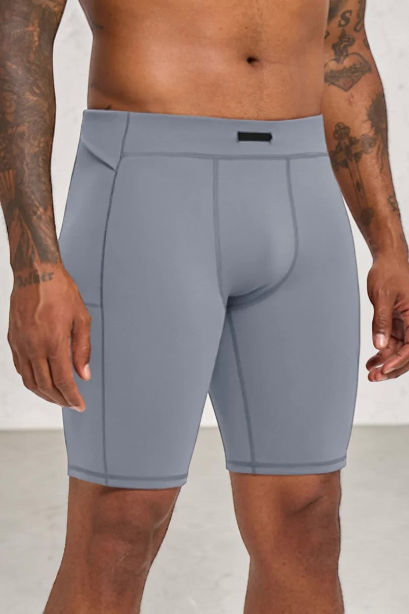 SOLID APPRL men's grey compression training shorts with a high-rise waistband and side pockets for athletic support.