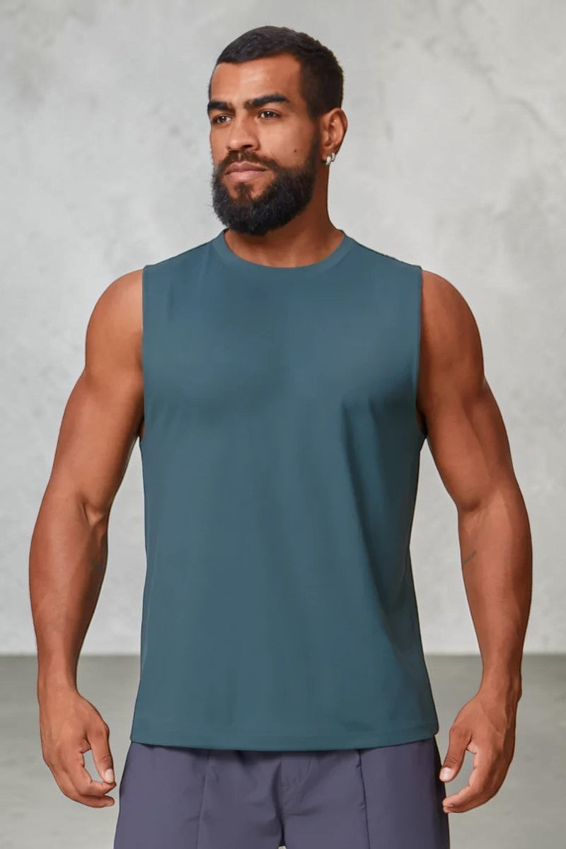 SOLID APPRL men's teal moisture-wicking performance tank top with crew neck worn by a muscular model.