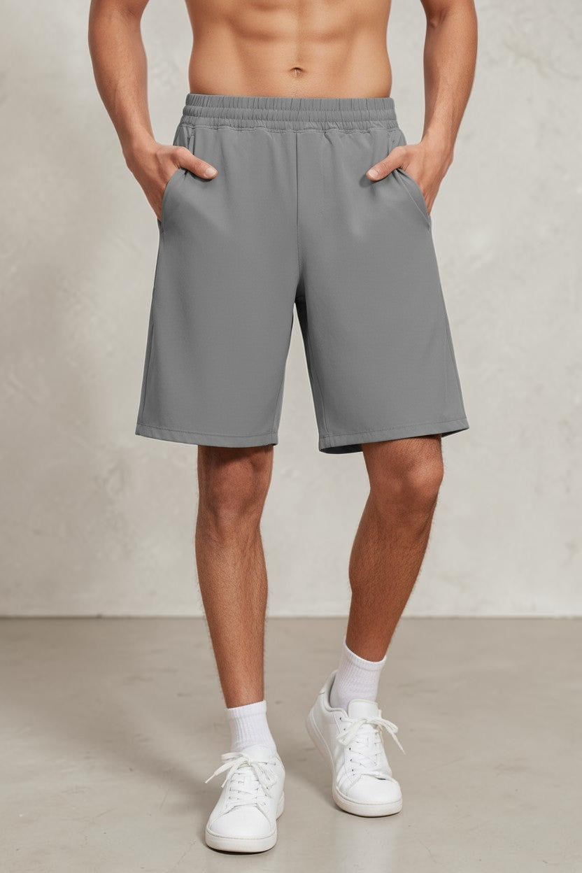 SOLID APPRL men's grey performance athletic training shorts with an elastic waistband and deep side pockets.