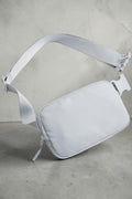 SOLID APPRL minimalist light grey belt bag with adjustable strap, secure zipper closure, and durable fabric.
