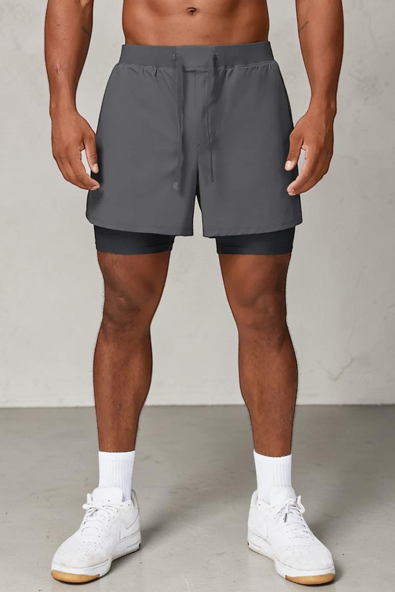 SOLID APPRL charcoal grey 2-in-1 performance training shorts with compression liner and adjustable drawstring waist.