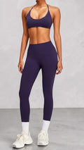 SOLID APPRL deep plum seamless high-waisted workout leggings with ribbed waistband detail.