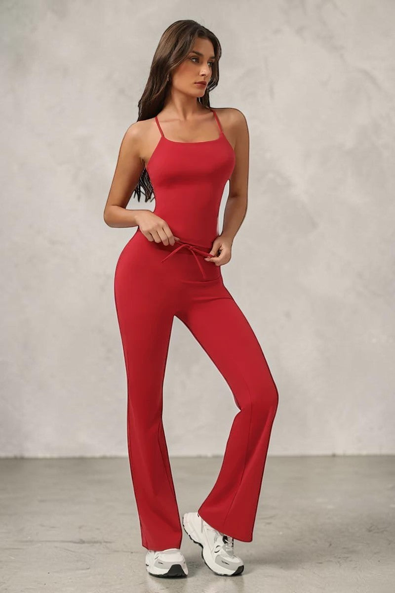 SOLID APPRL red athletic tank top and flared leggings set with criss-cross back straps and drawstring waist.