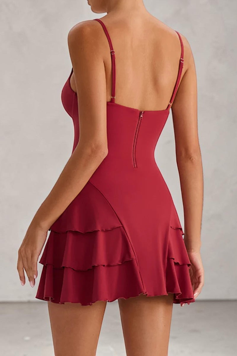 SOLID APPRL red tiered mini dress with spaghetti straps and back zipper detail on a model