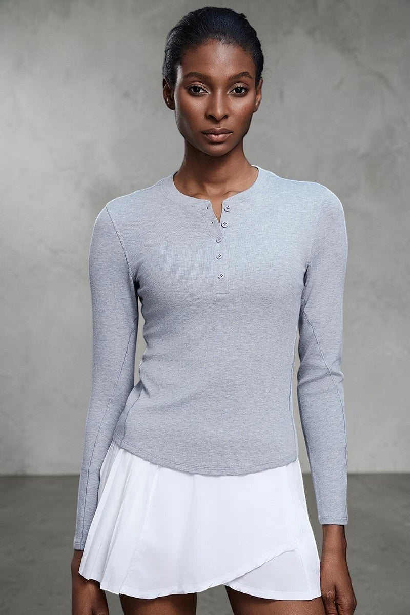 SOLID APPRL light grey ribbed knit long sleeve henley shirt with button placket and subtle seam detailing.