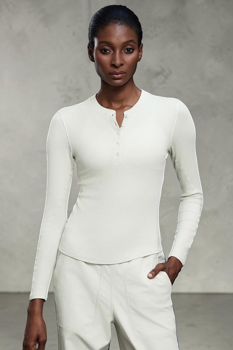 SOLID APPRL off-white ribbed knit long sleeve henley shirt with button placket and subtle seam detailing.