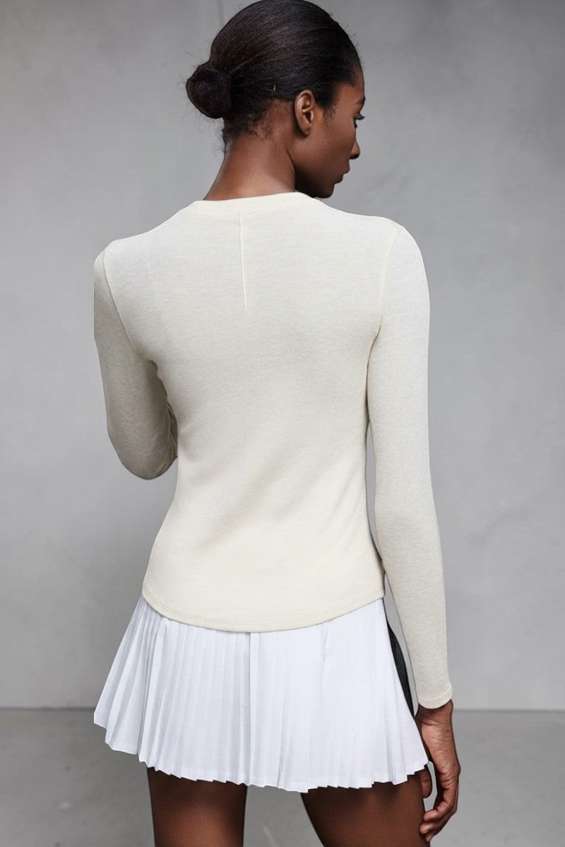 SOLID APPRL light grey ribbed knit long sleeve henley shirt with button placket and subtle seam detailing.