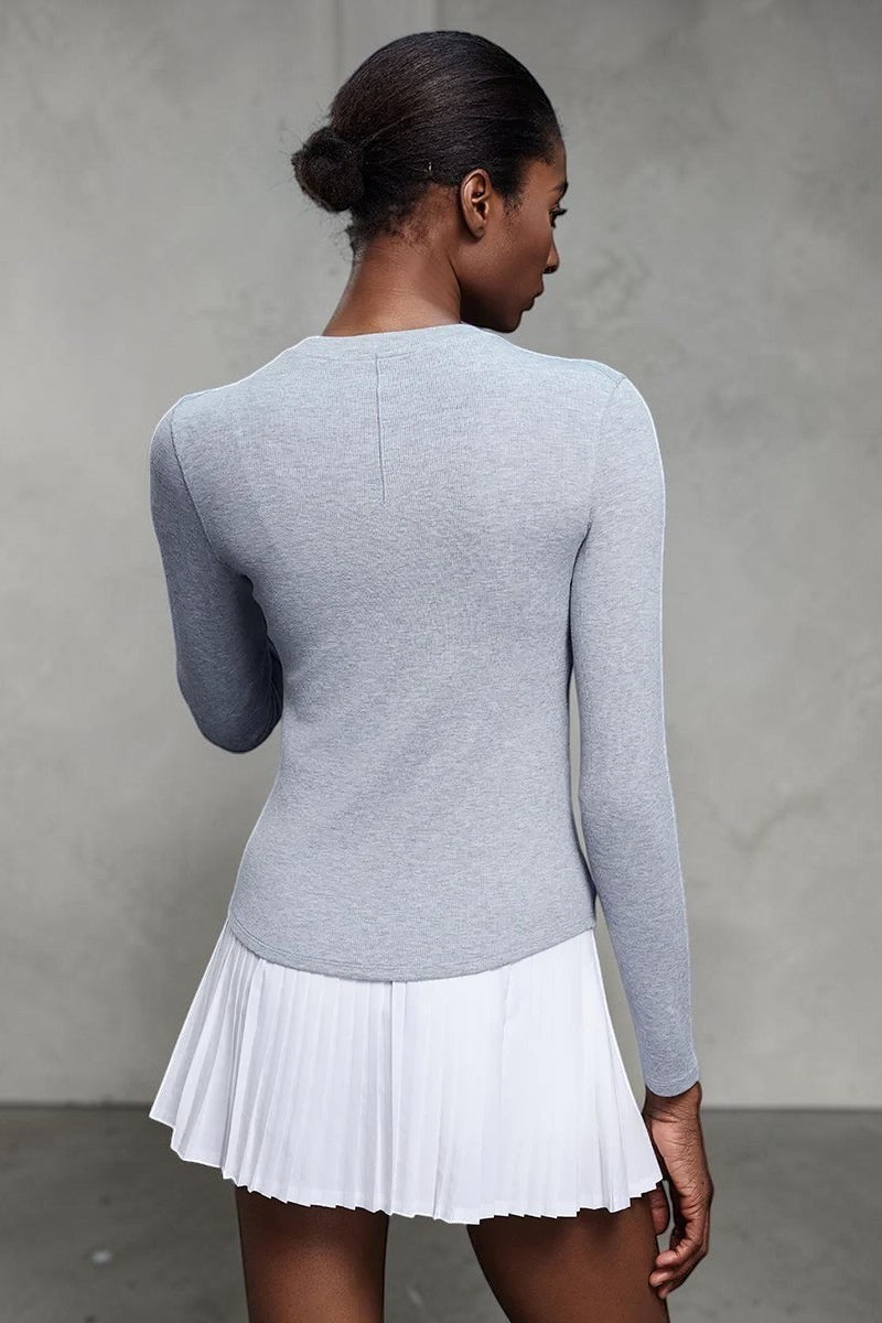 SOLID APPRL light grey ribbed knit long sleeve henley shirt with button placket and subtle seam detailing.