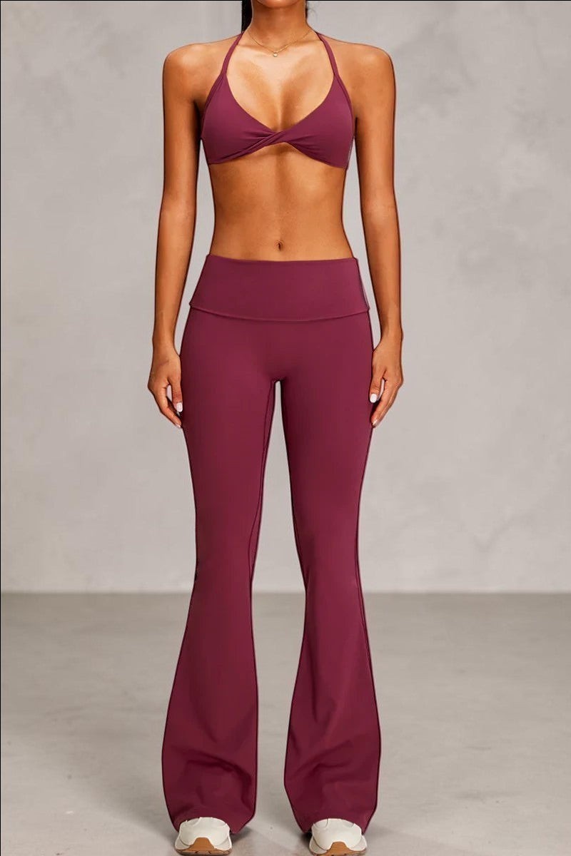 SOLID APPRL women's high-waisted flare yoga pants in deep berry. Stretchy, breathable fabric with a flattering fit.