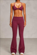 SOLID APPRL women's high-waisted flare yoga pants in deep berry. Stretchy, breathable fabric with a flattering fit.